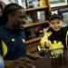 Five-year-old Jacob Piro meets Michigan senior quarterback Denard Robinson on Saturday, Feb. 2. Daniel Brenner I AnnArbor.com